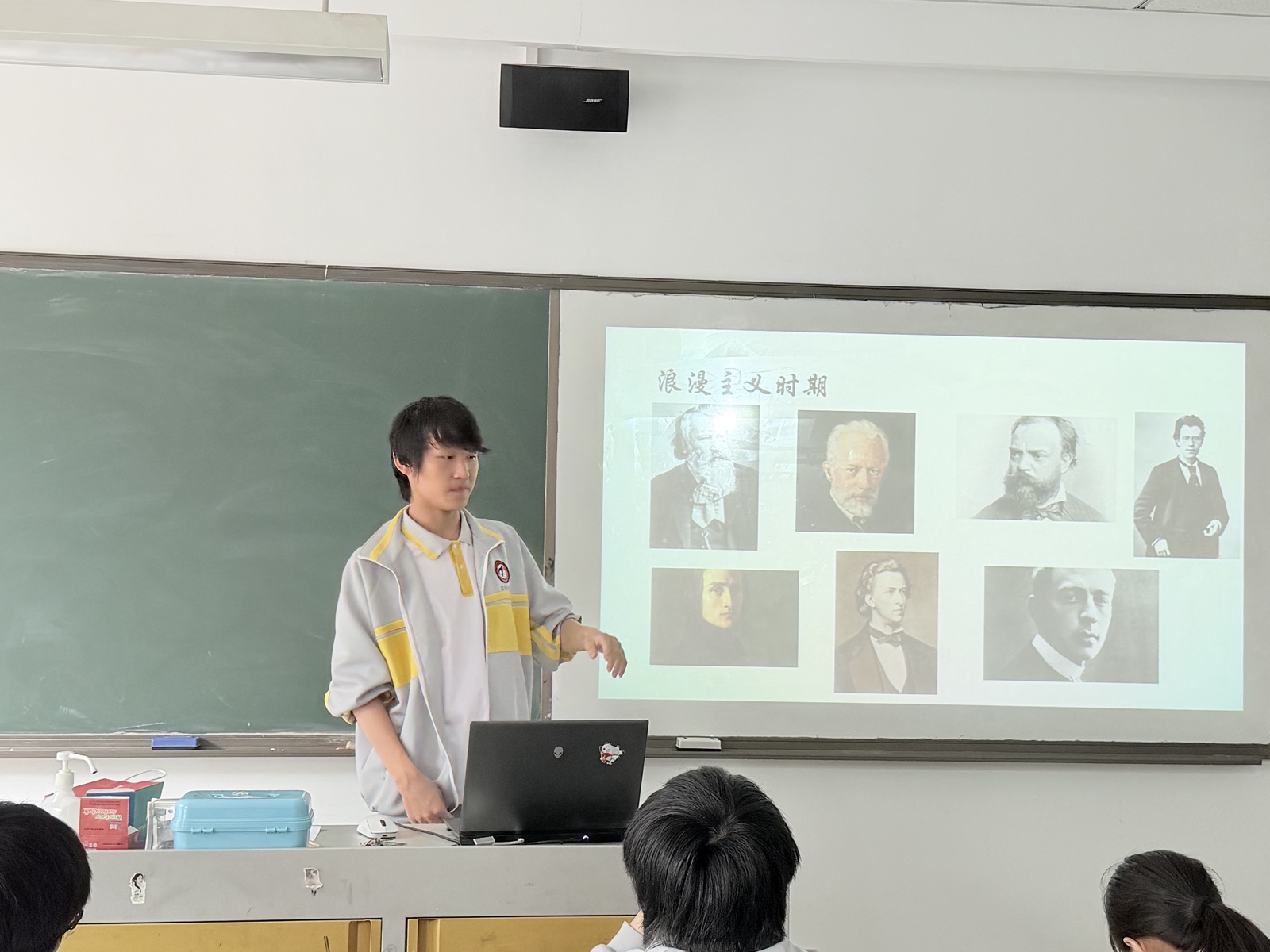 James introducing romantic period composers to classmates.