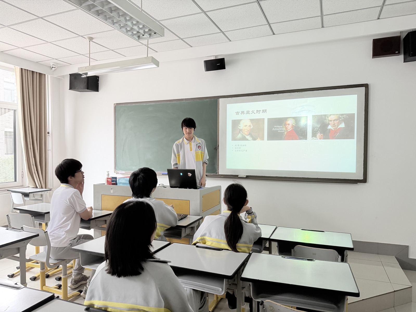 James presenting classical period composers including Haydn, Mozart, and Beethoven.